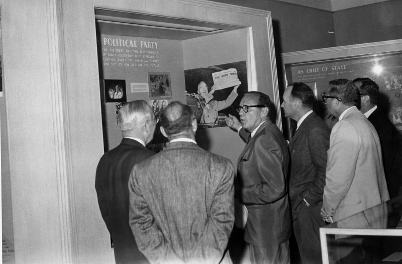 Harry Truman and Jack Benny viewing the Dewey Defeats Truman headline image
